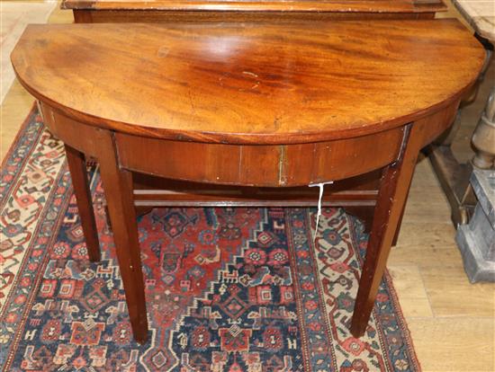 A George III mahogany D shaped side table W.100cm